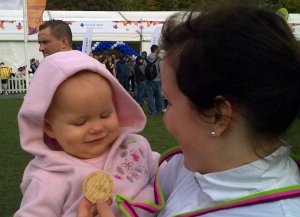 One year old baby girl in pink