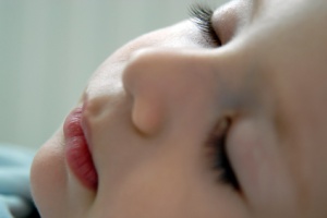 Sleeping baby in dreams close up