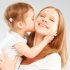baby and mom laughing