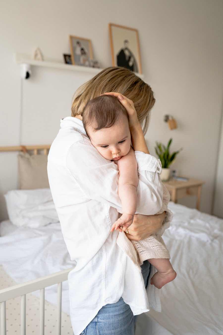 Mom holding baby to sleep