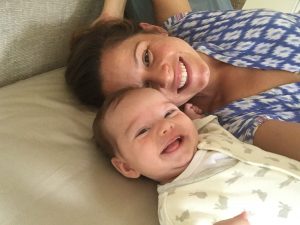 Dad holding baby daughter