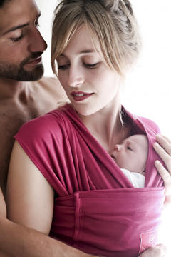 Newborn baby in Hug a Bub sling