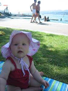 Ten months old baby playing at Zurich lake