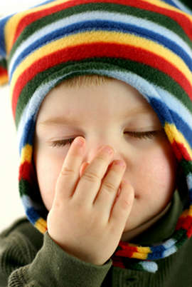 Toddler sneezing